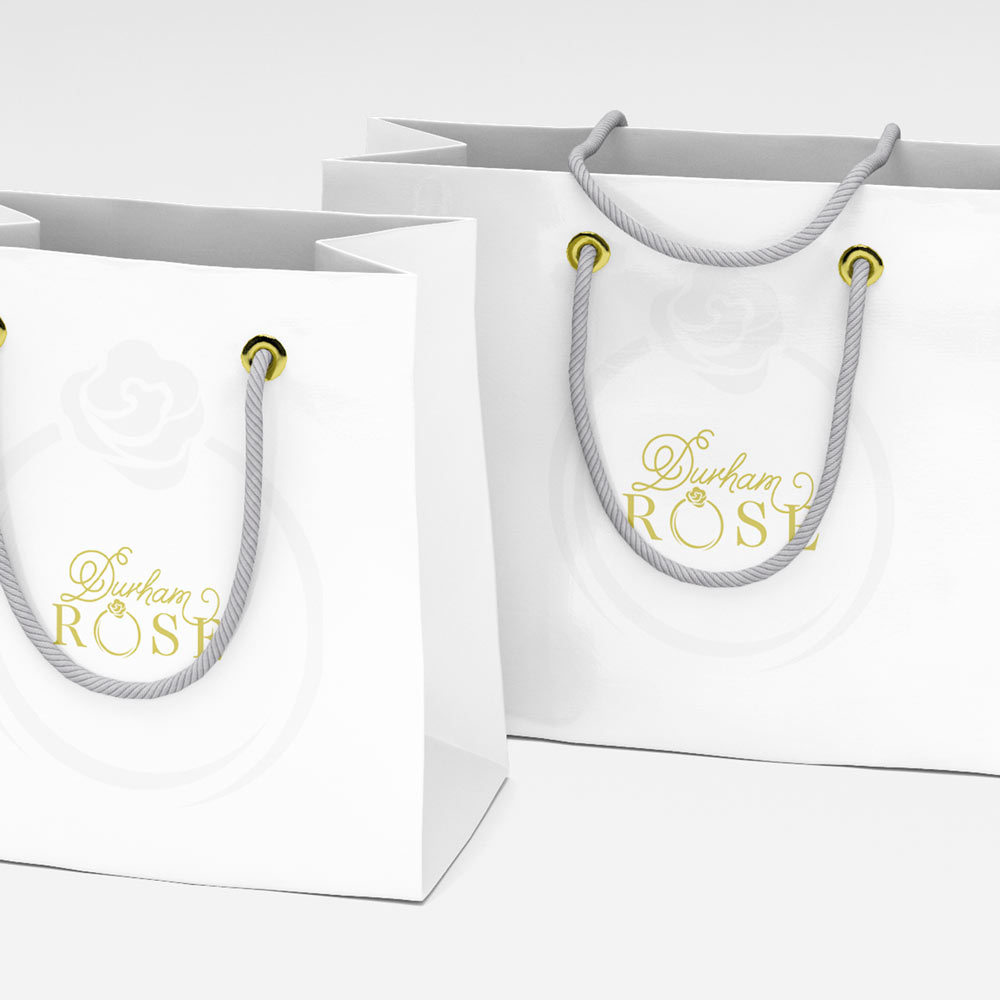 Durham rose logo on bags - branding