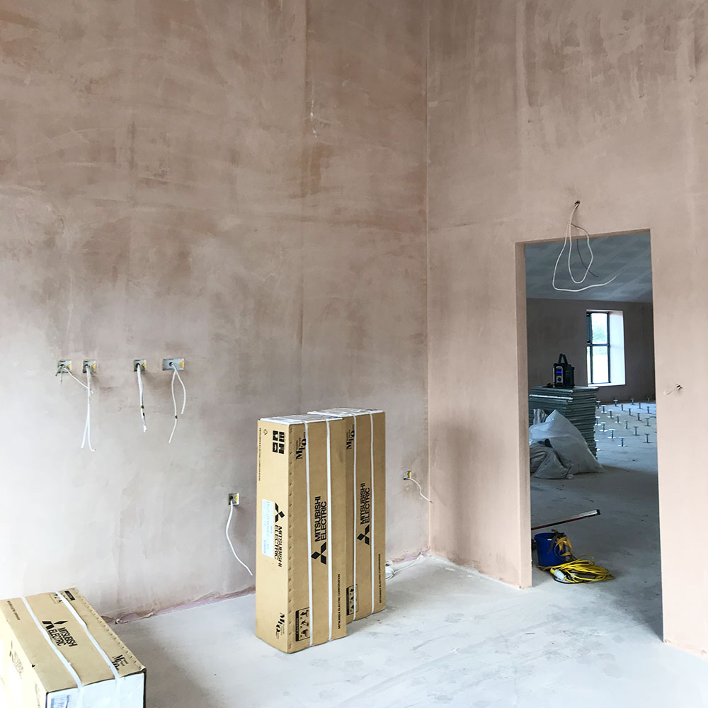 Plastered walls with wires popping out